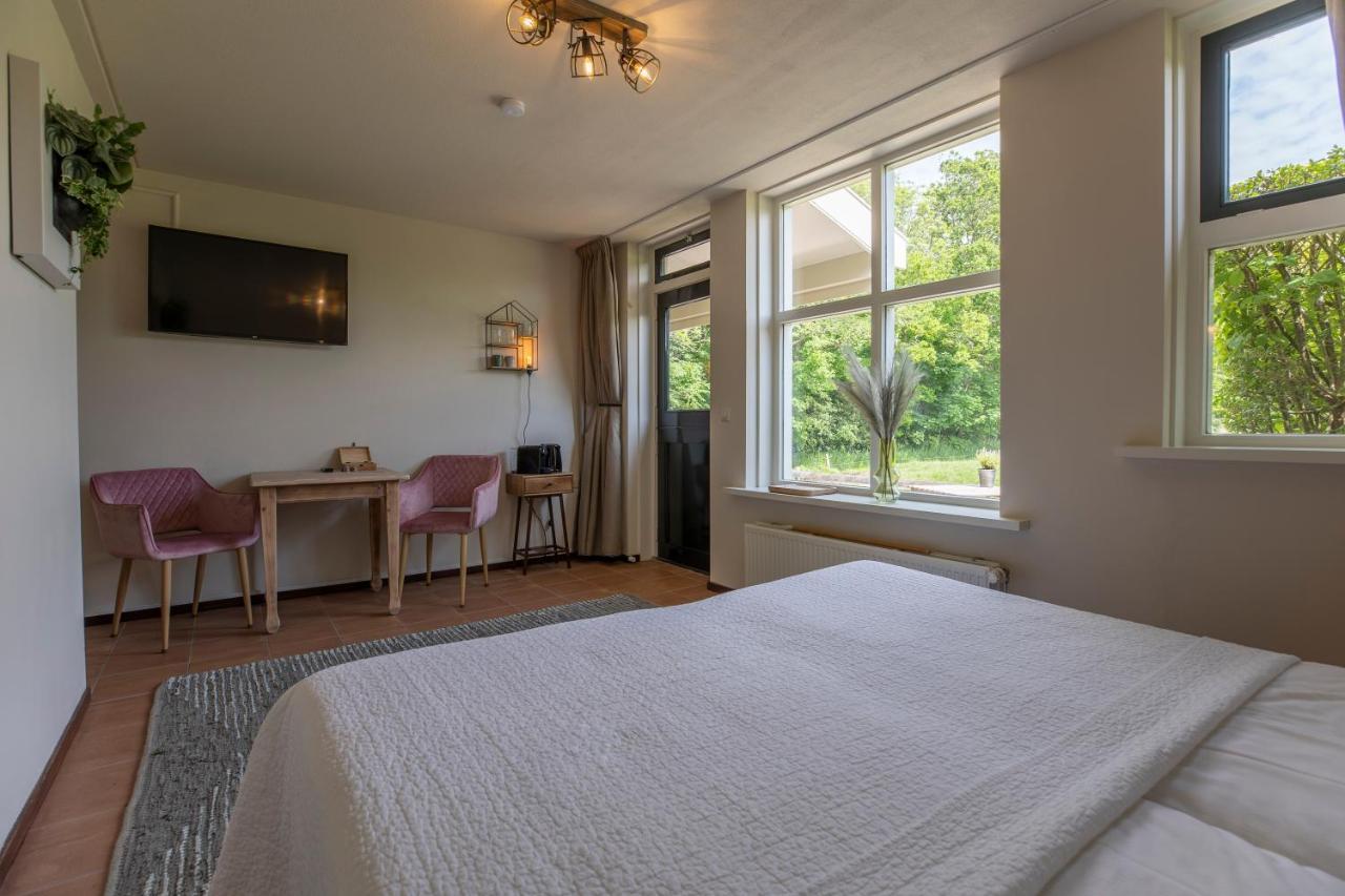 Hotel Bed & Bos De 14 Sterren à Den Burg Extérieur photo